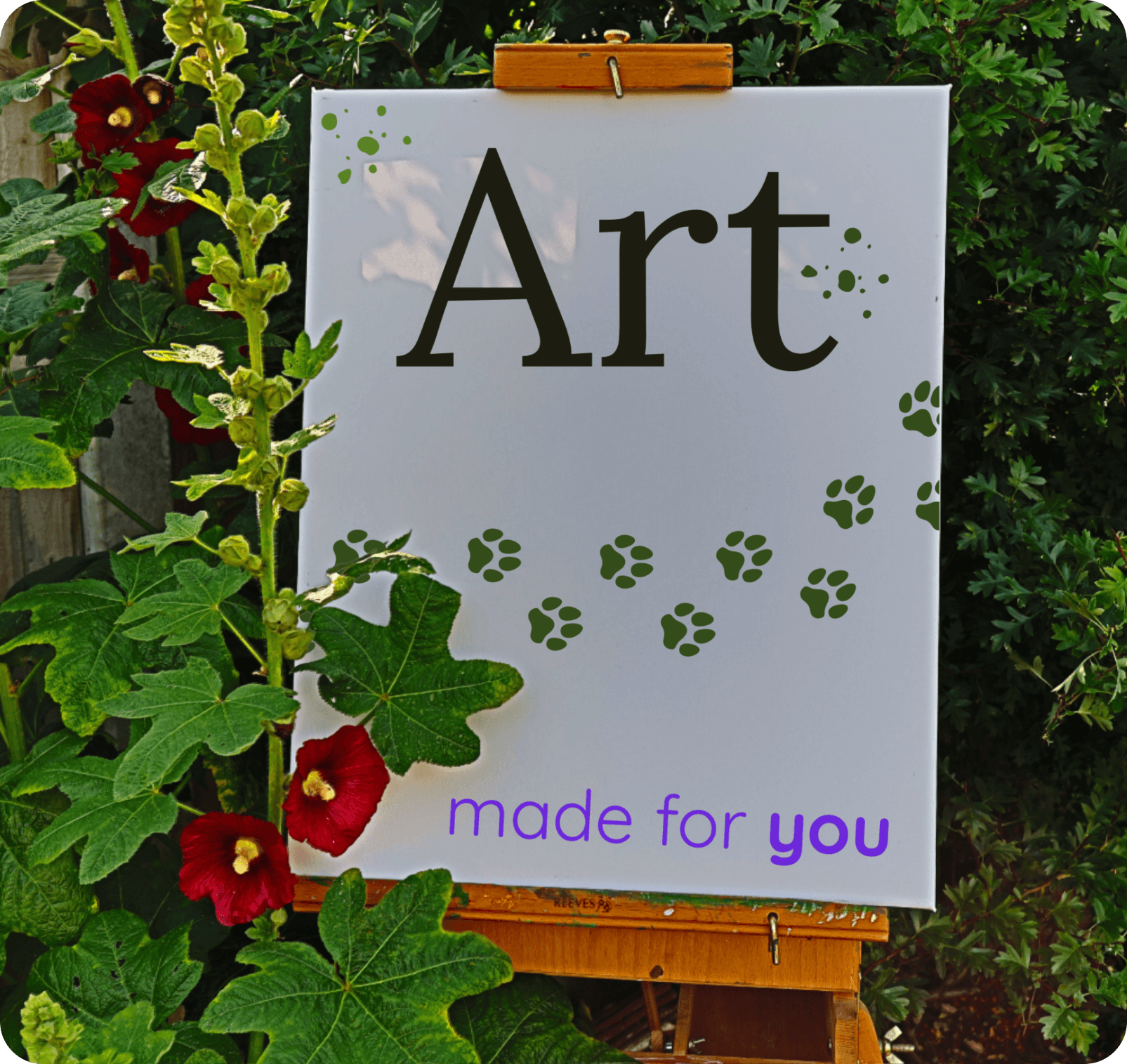 A canvas reading 'Art made for you' on an easel, surrounded by hollyhocks and a trail of green paw prints.